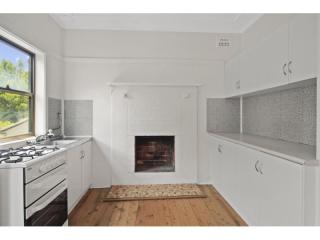 View profile: Charming 3-Bedroom Home with a Sunny Sunroom and Enclosed Backyard in Coniston, NSW