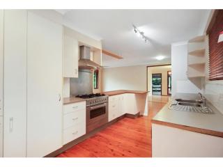 View profile: Spacious Five-Bedroom Home with Multiple Living Areas in Prime Location