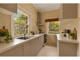 View profile: Renovated Two-Bedroom Apartment with Sunroom, Free Wi-Fi and Water Included, Moments from the City and Coast
