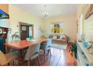 View profile: Spacious Three-Bedroom Home with Modern Amenities